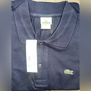 Lacoste polo shirt medium 
New with tags never worn, blue